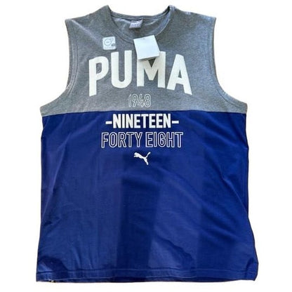Gray and blue sleeveless Puma shirt with branding on a white background